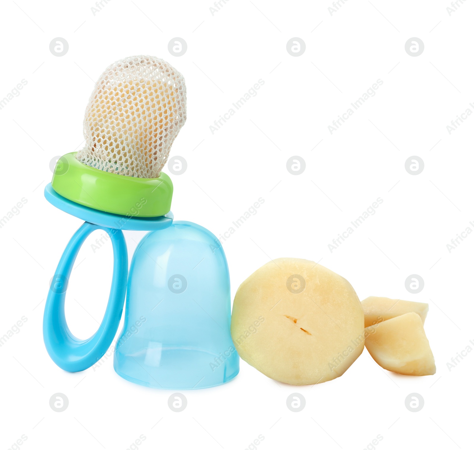 Photo of Nibbler with boiled potato on white background. Baby feeder