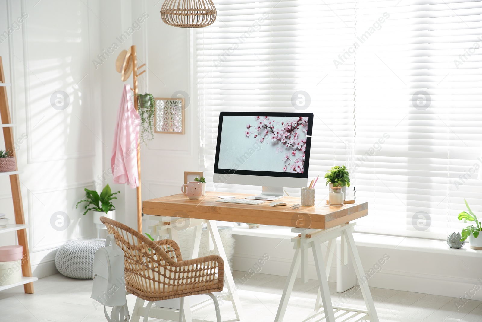 Photo of Stylish home office interior with comfortable workplace