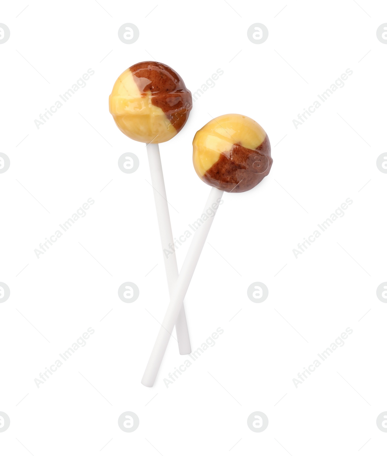 Photo of Two sweet colorful lollipops isolated on white, top view