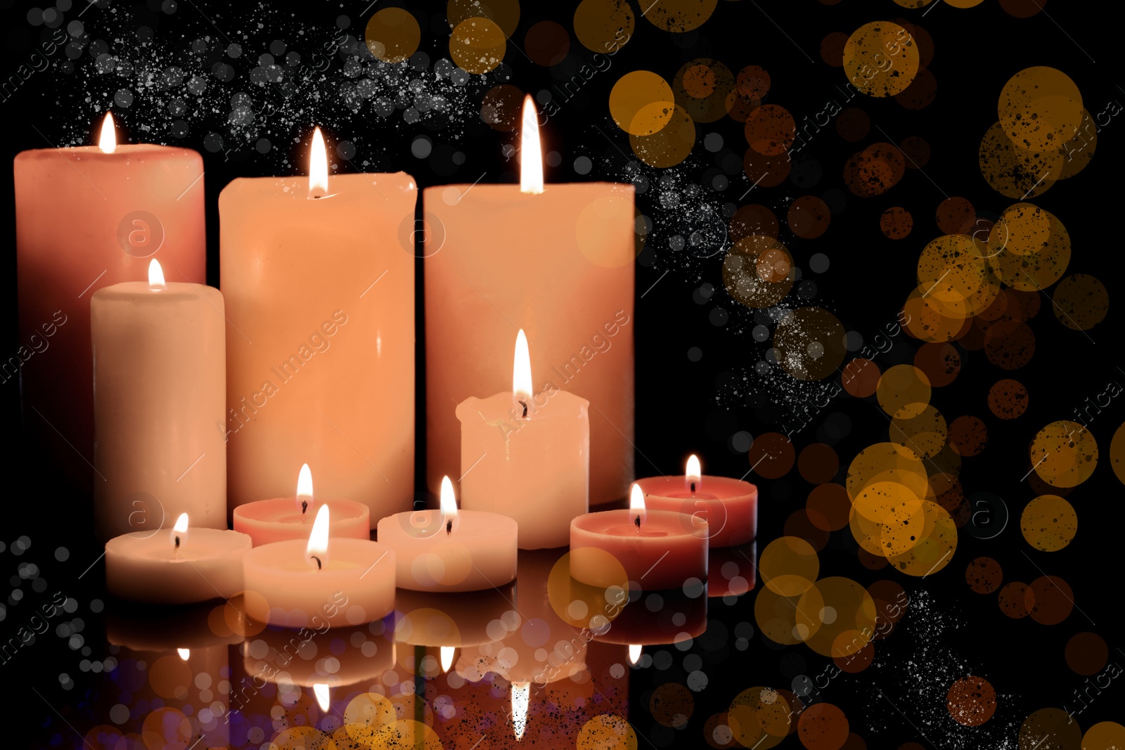 Image of Burning candles on dark background, bokeh effect