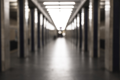 Photo of Blurred view of subway station. Bokeh effect