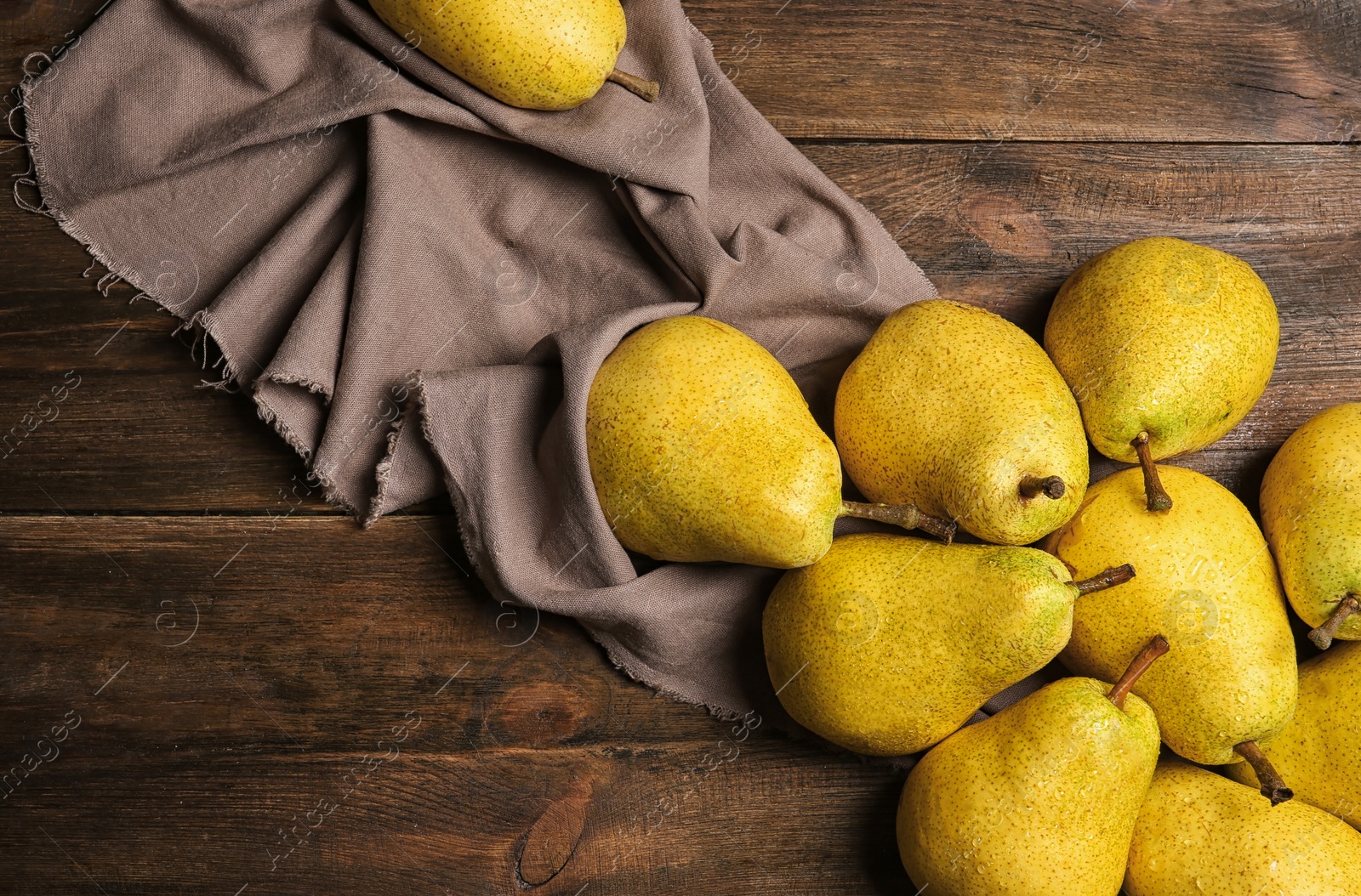 Photo of Flat lay composition with fresh ripe pears on wooden background