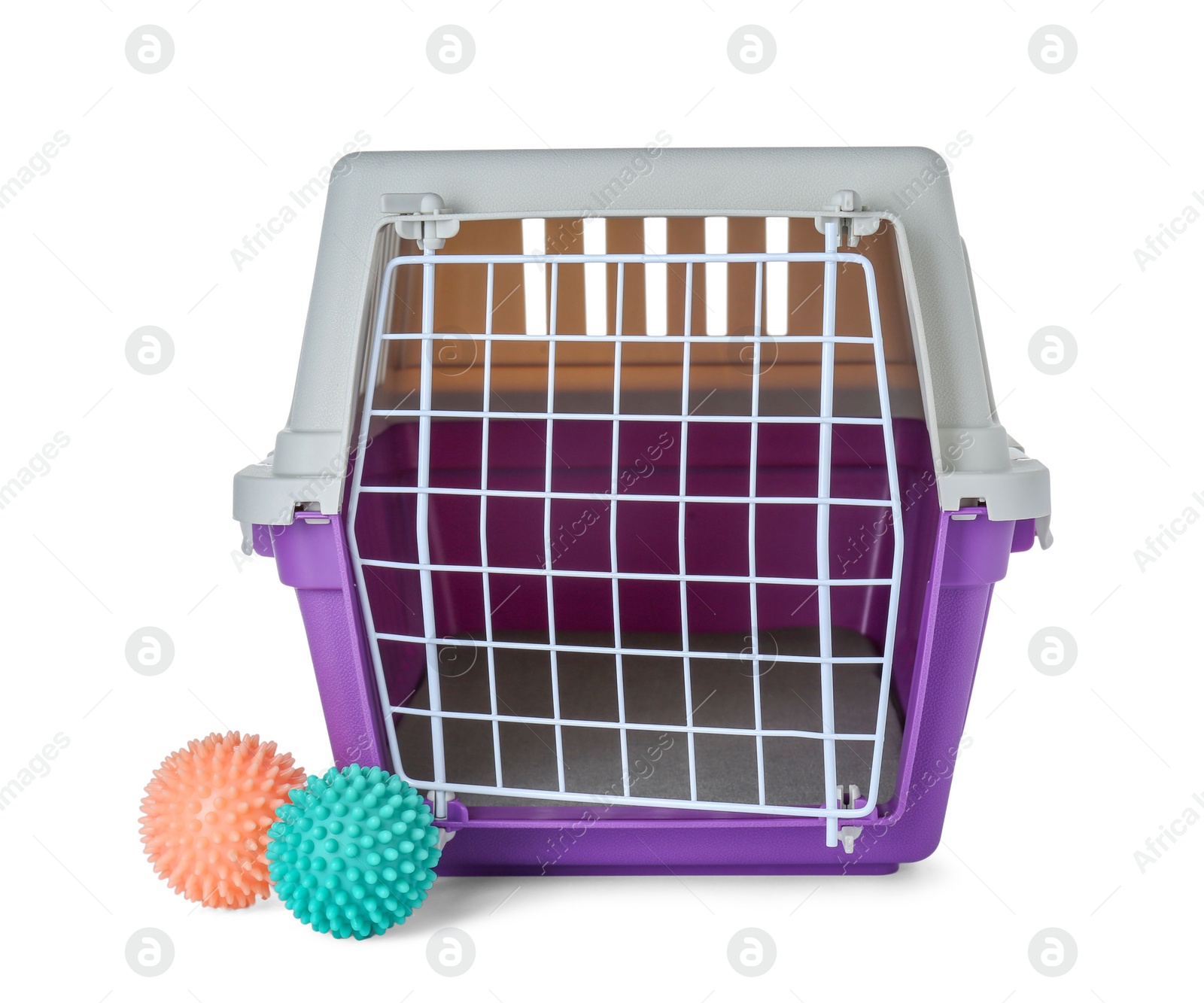 Photo of Violet pet carrier and toys isolated on white