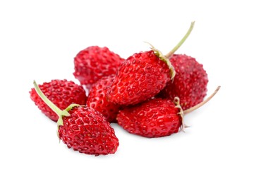 Ripe red wild strawberries isolated on white