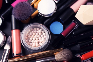 Photo of Set of different makeup products and tools as background, top view