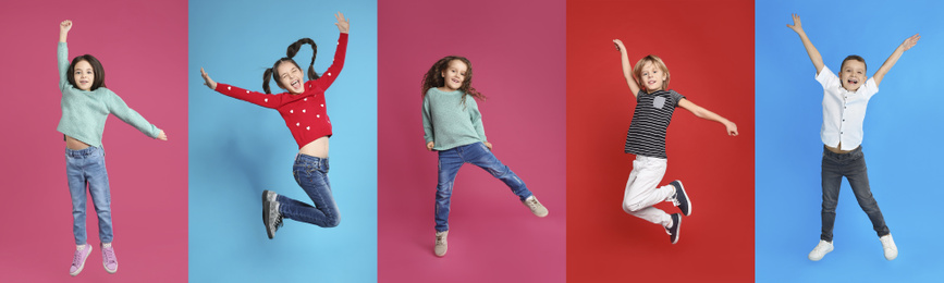 Image of Collage of emotional children jumping on different color backgrounds. Banner design