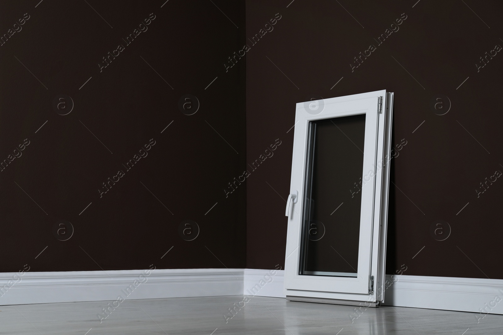 Photo of Modern single casement window near dark brown wall indoors, space for text