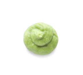 Photo of Swirl of delicious spicy wasabi paste isolated on white, top view