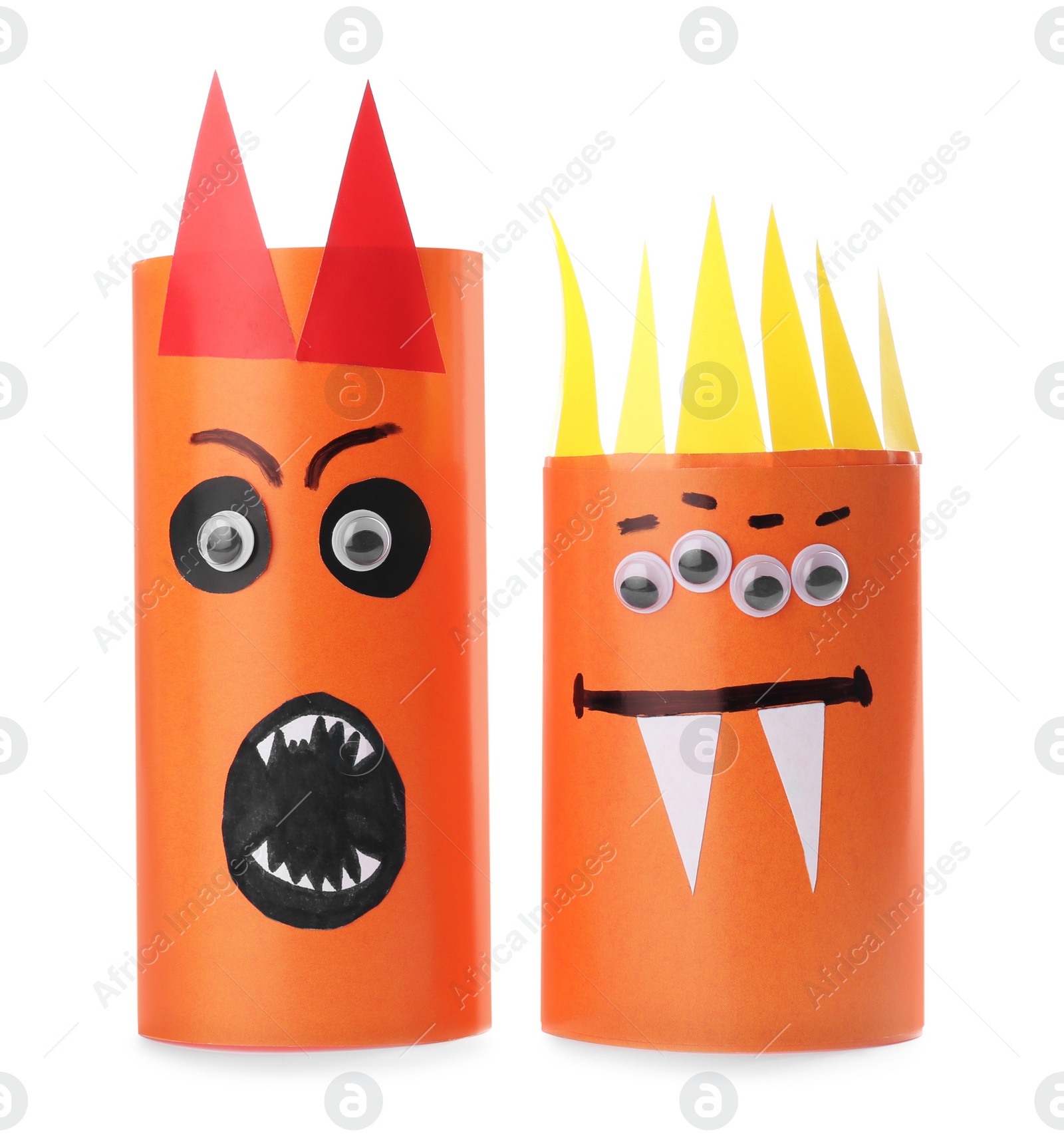 Photo of Funny monsters on white background. Halloween decoration