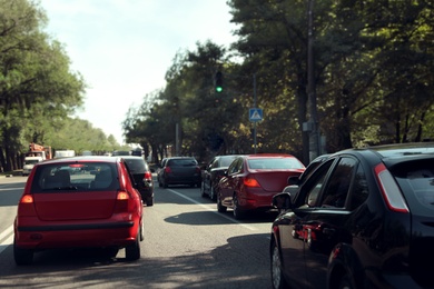 Cars in traffic jam on city street