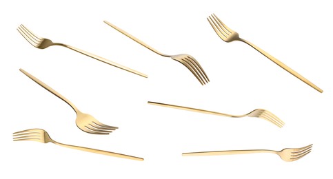 Image of Shiny golden forks isolated on white, set