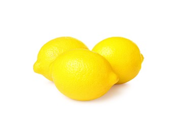 Photo of Three fresh ripe lemons isolated on white