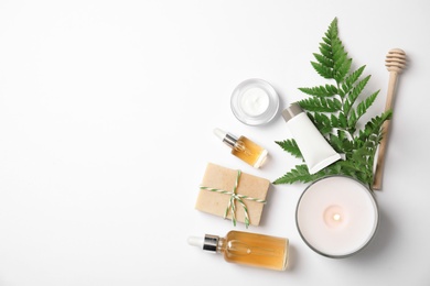 Photo of Flat lay composition with different body care products and space for text on white background