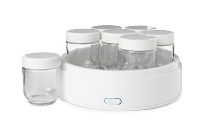 Modern yogurt maker with empty jars on white background