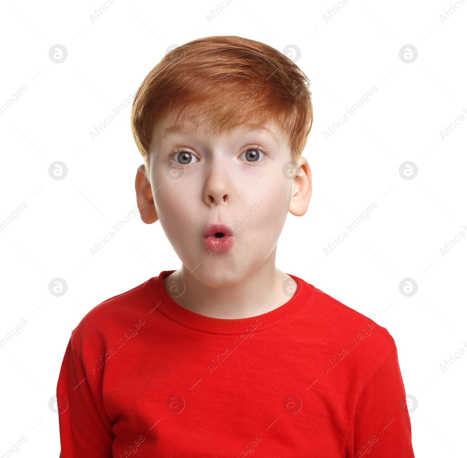 Photo of Portrait of surprised little boy on white background