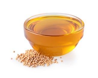 Photo of Bowl of natural oil and mustard seeds on white background