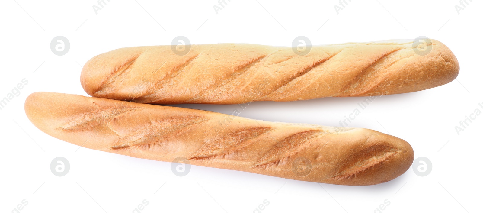 Photo of Tasty baguettes on white background, top view. Fresh bread