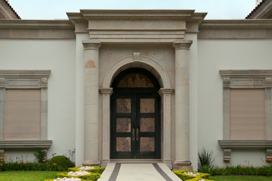 Photo of Entrance of house with beautiful arched door