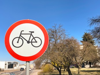 Photo of Road sign No Bicycles outdoors on sunny day