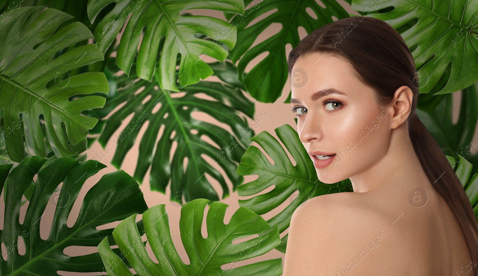 Image of Beautiful young woman and tropical leaves, banner design. Spa portrait