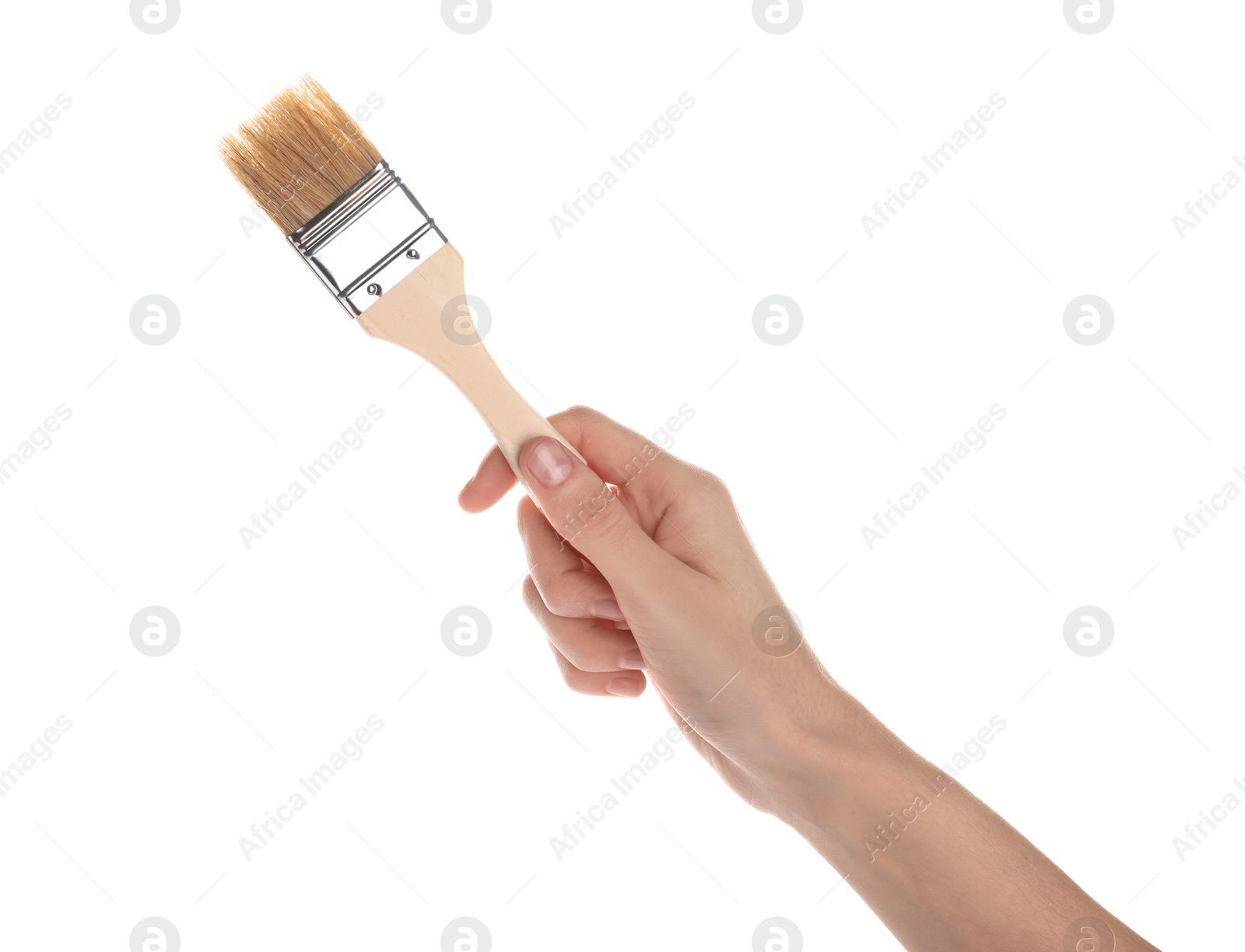 Photo of Woman holding paint brush on white background, closeup