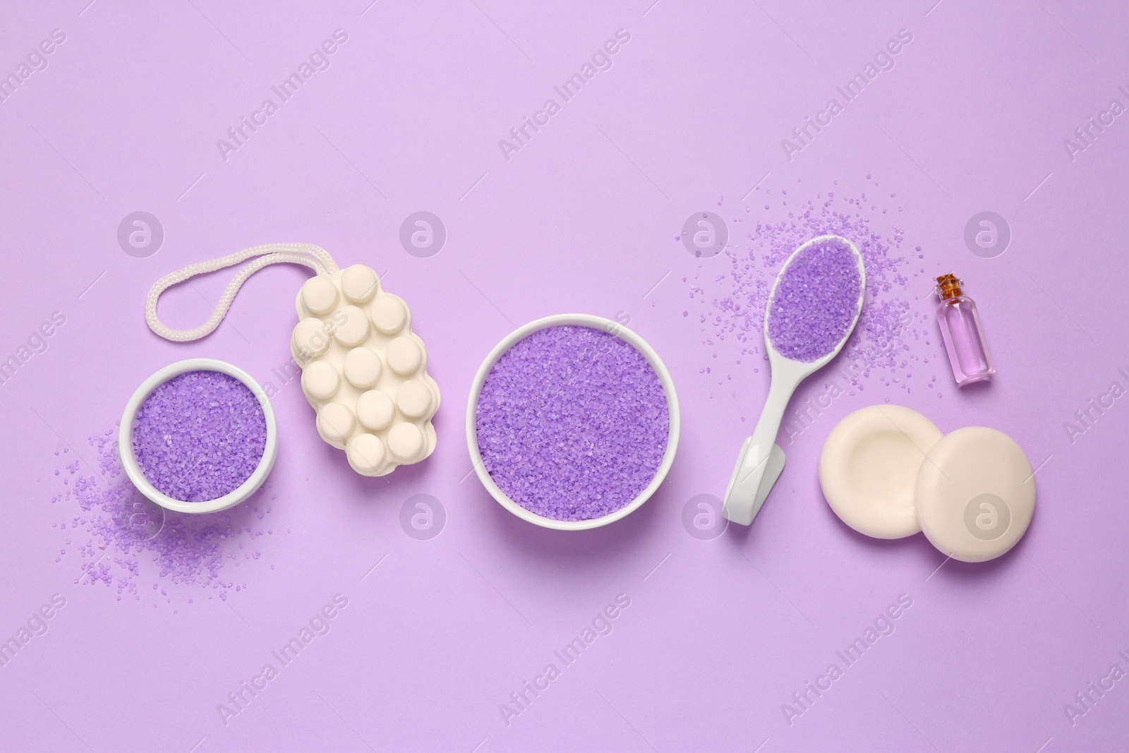 Photo of Flat lay composition with aromatic sea salt on purple background