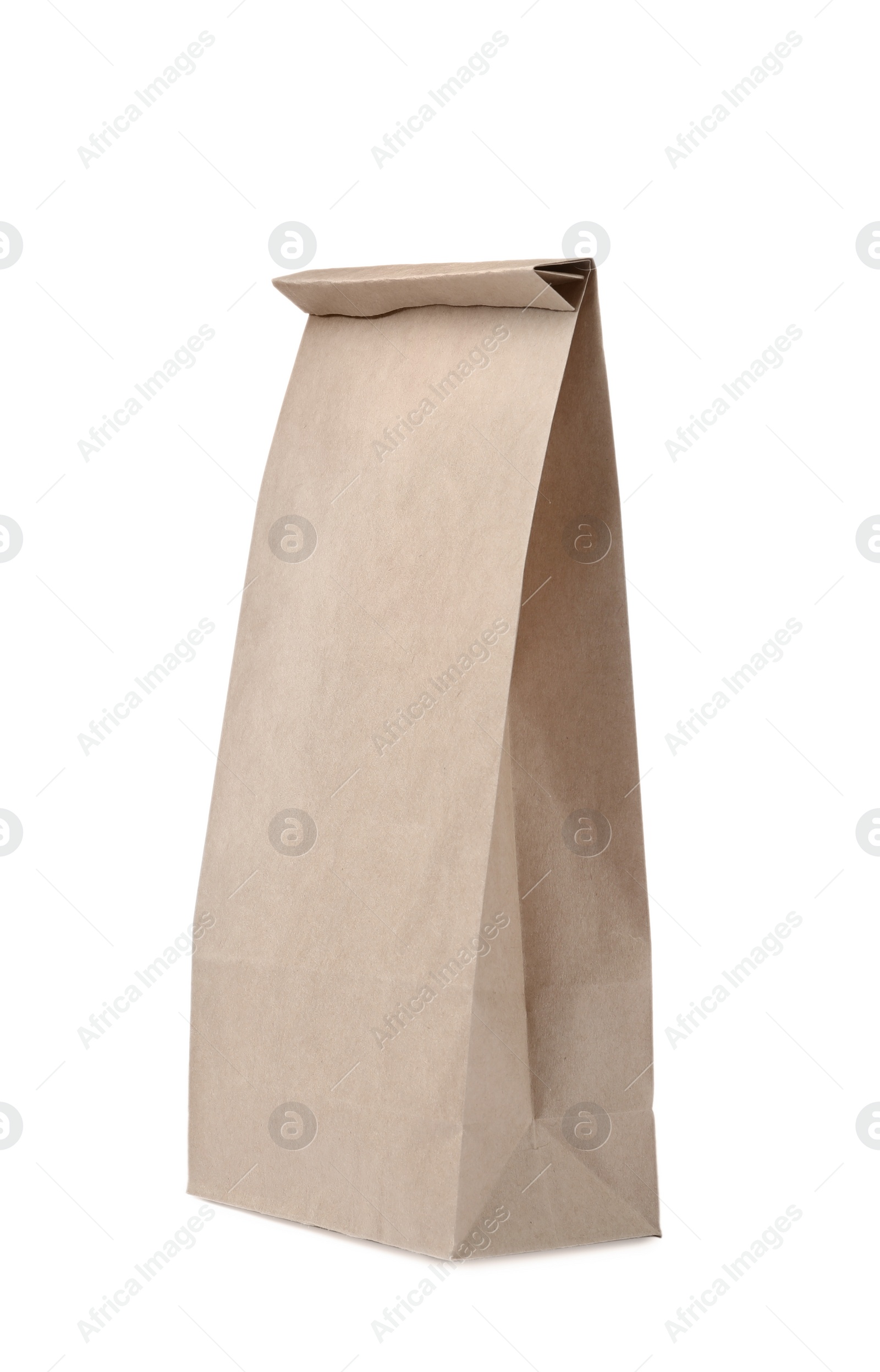 Photo of Closed kraft paper bag isolated on white