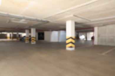 Blurred view of modern car parking garage
