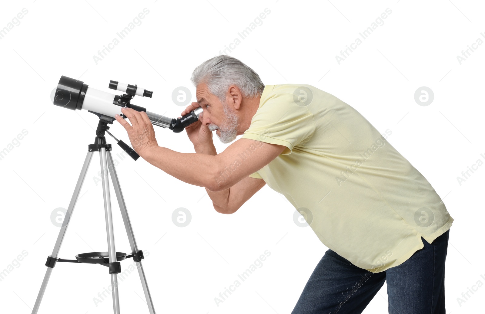 Photo of Senior astronomer looking at stars through telescope on white background