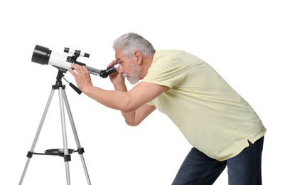 Photo of Senior astronomer looking at stars through telescope on white background