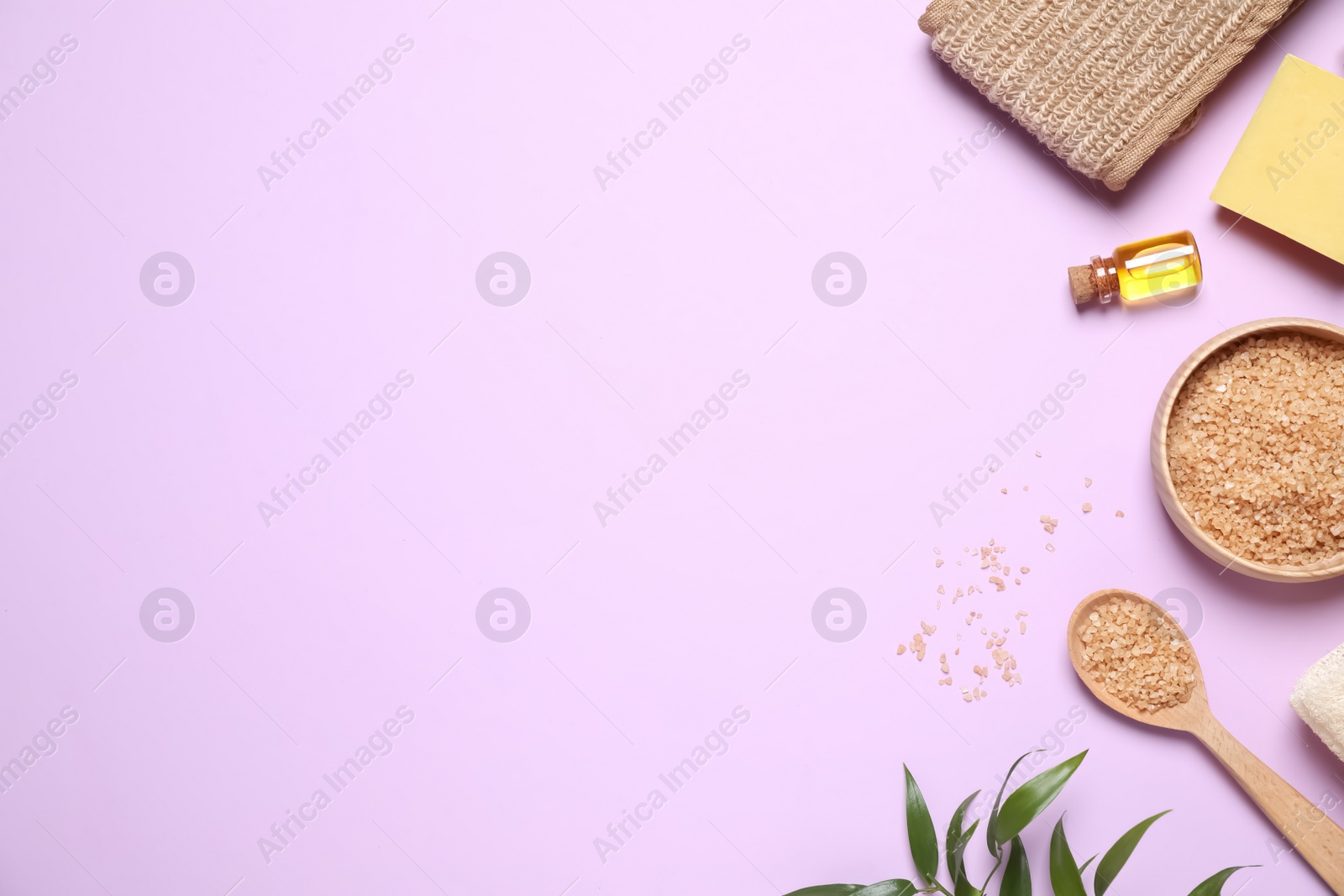 Photo of Flat lay composition with salt and cosmetic products on violet background. Space for text