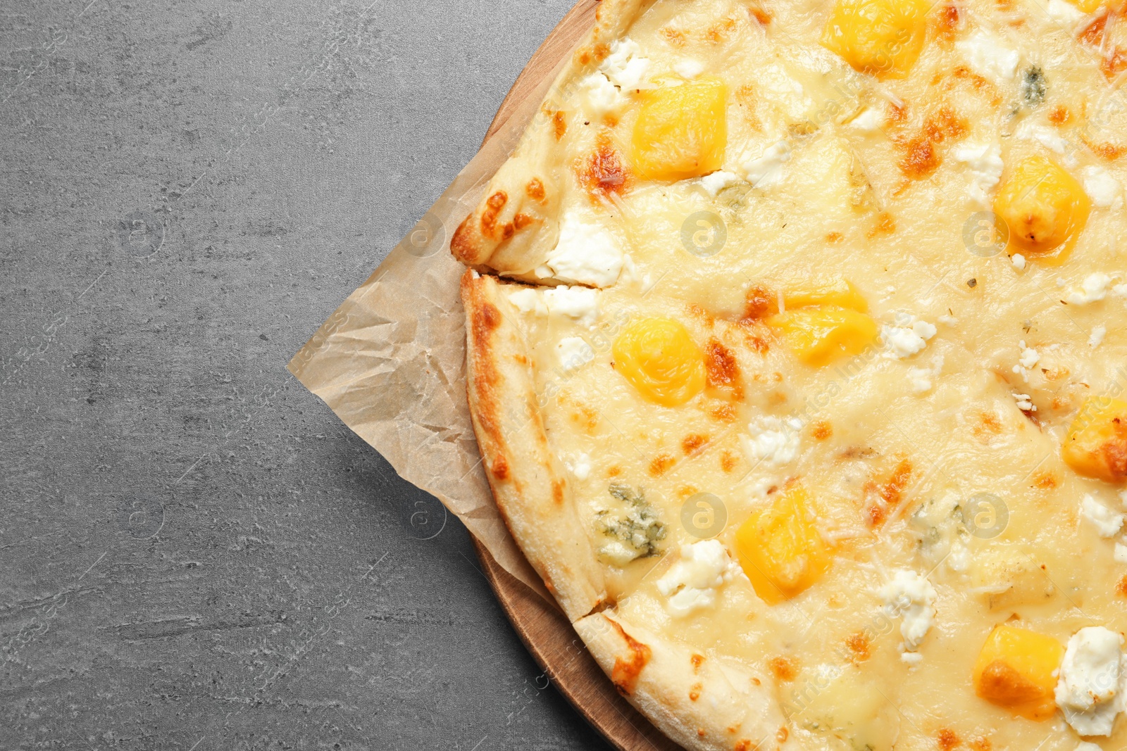 Photo of Hot cheese pizza Margherita on grey background, top view. Space for text