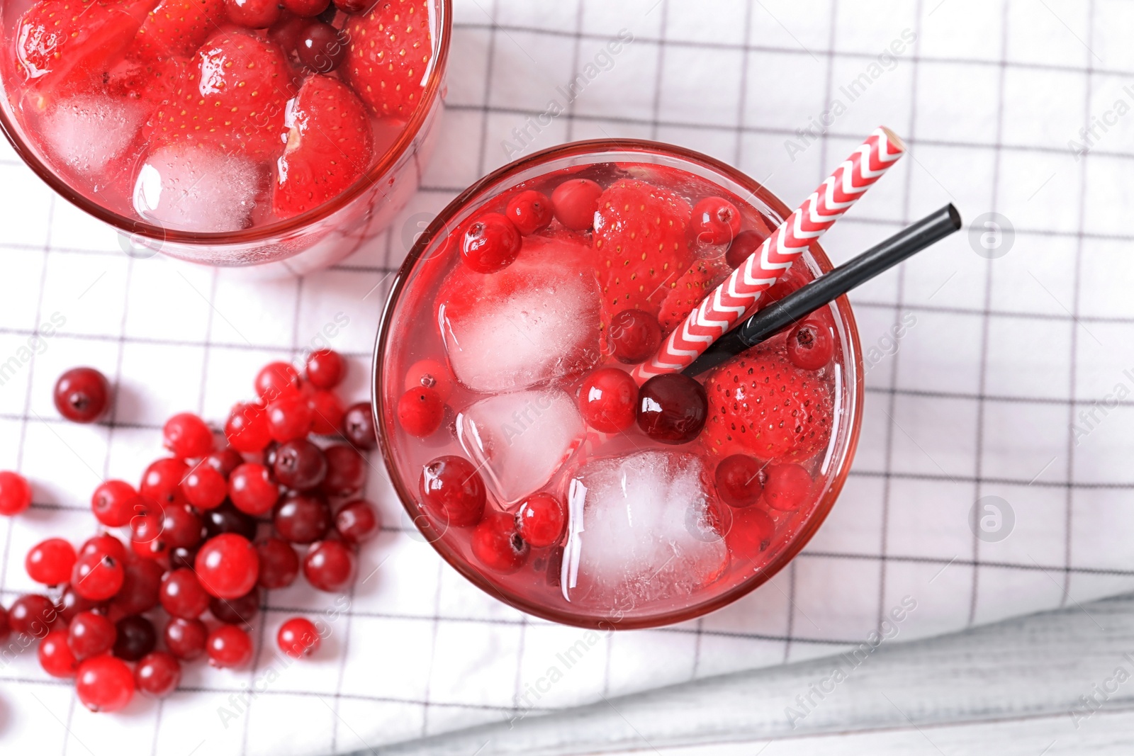 Photo of Flat lay composition with glasses of natural lemonade on table