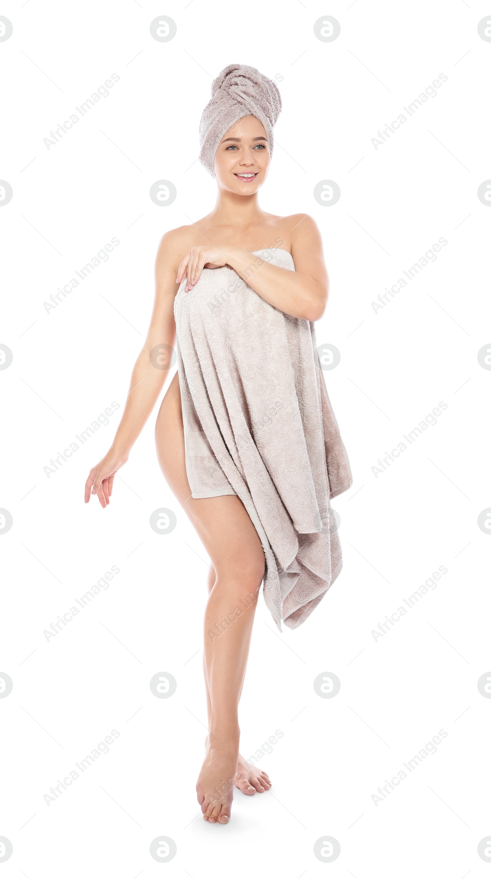 Photo of Full length portrait of young pretty woman with towels on white background