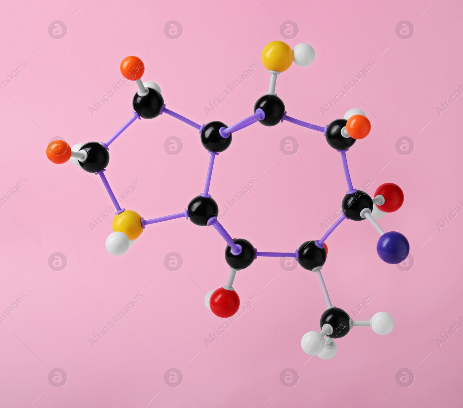 Photo of Structure of molecule on pink background. Chemical model