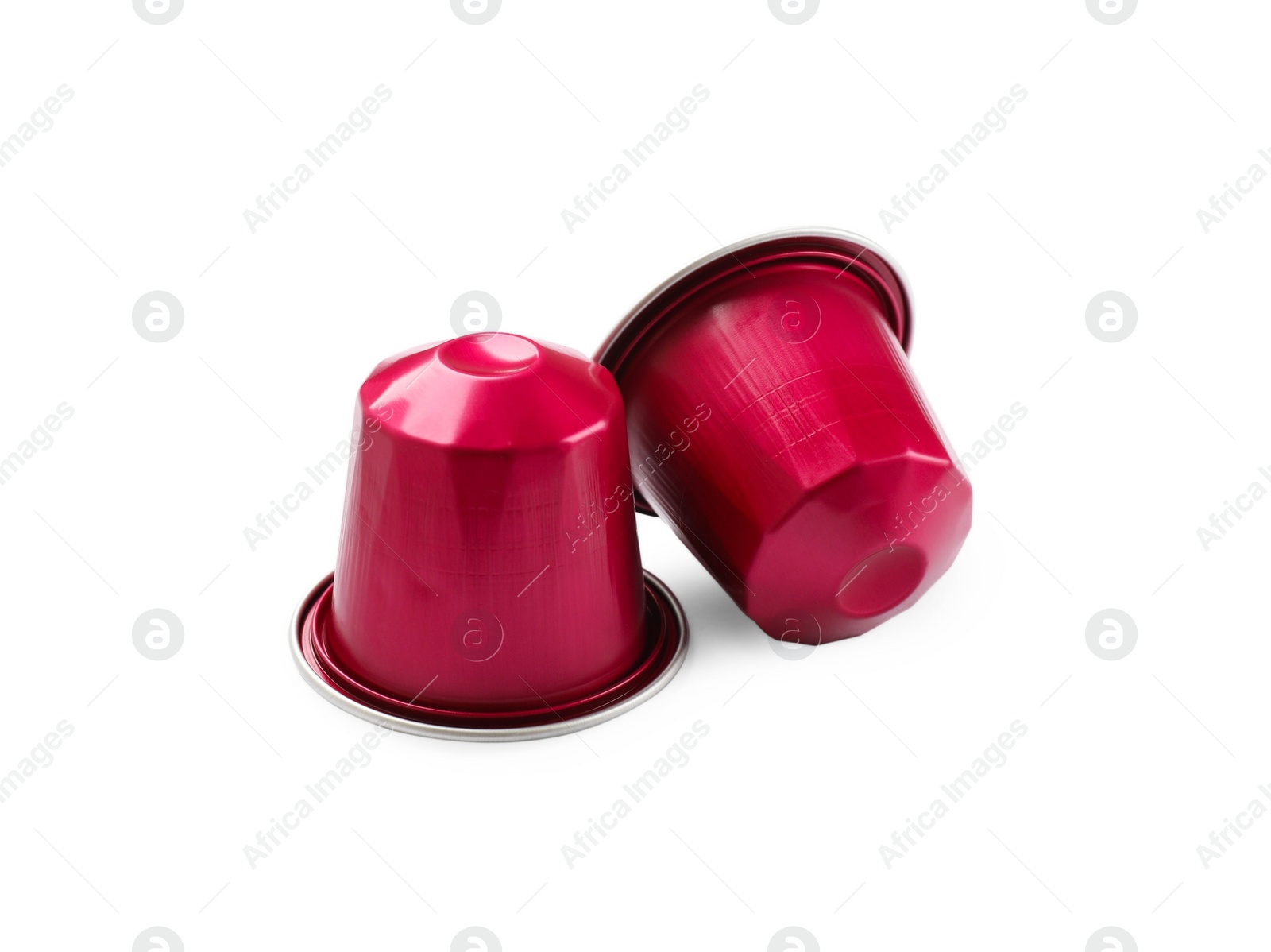 Photo of Two plastic coffee capsules isolated on white