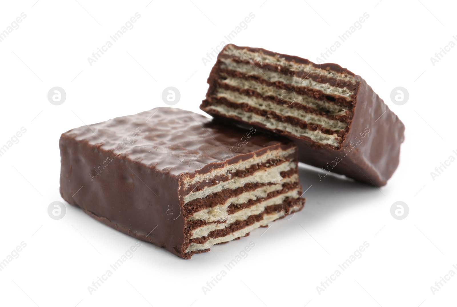 Photo of Halves of wafer stick with chocolate coating isolated on white