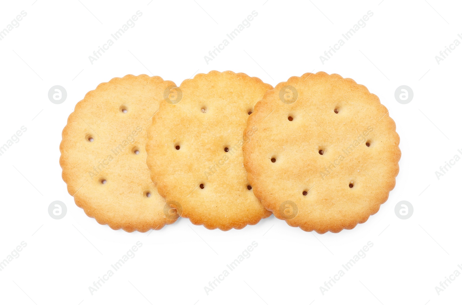 Photo of Three crispy crackers isolated on white, top view. Delicious snack