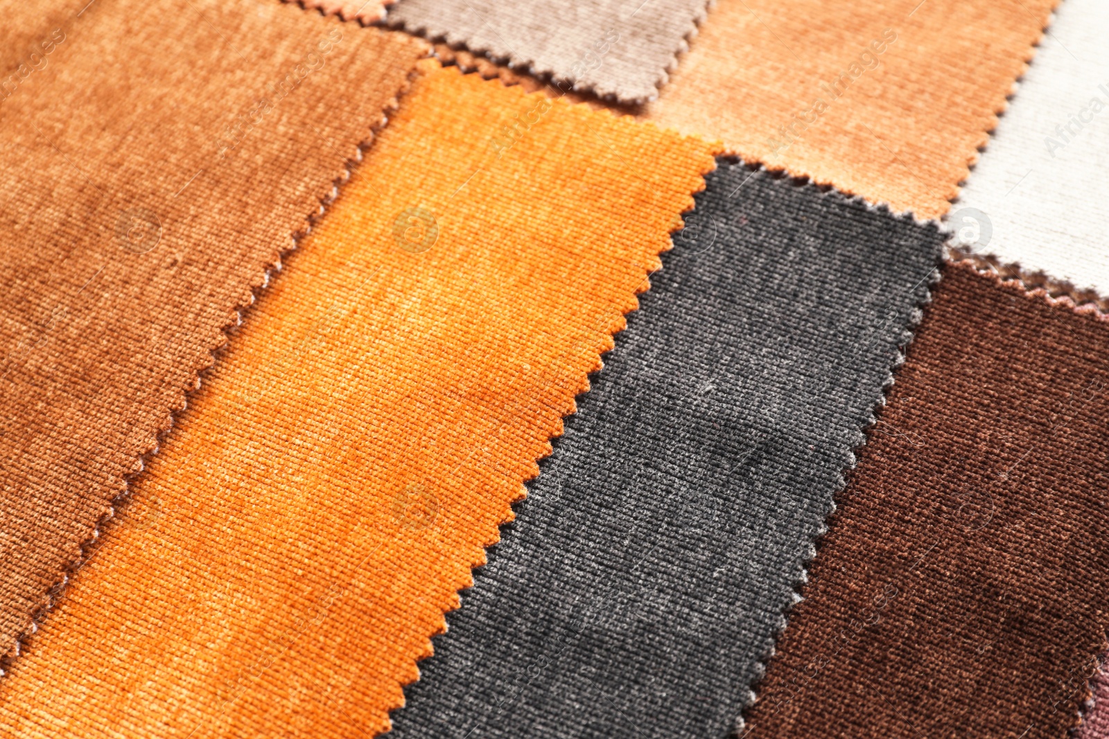 Photo of Fabric samples of different colors for interior design as background