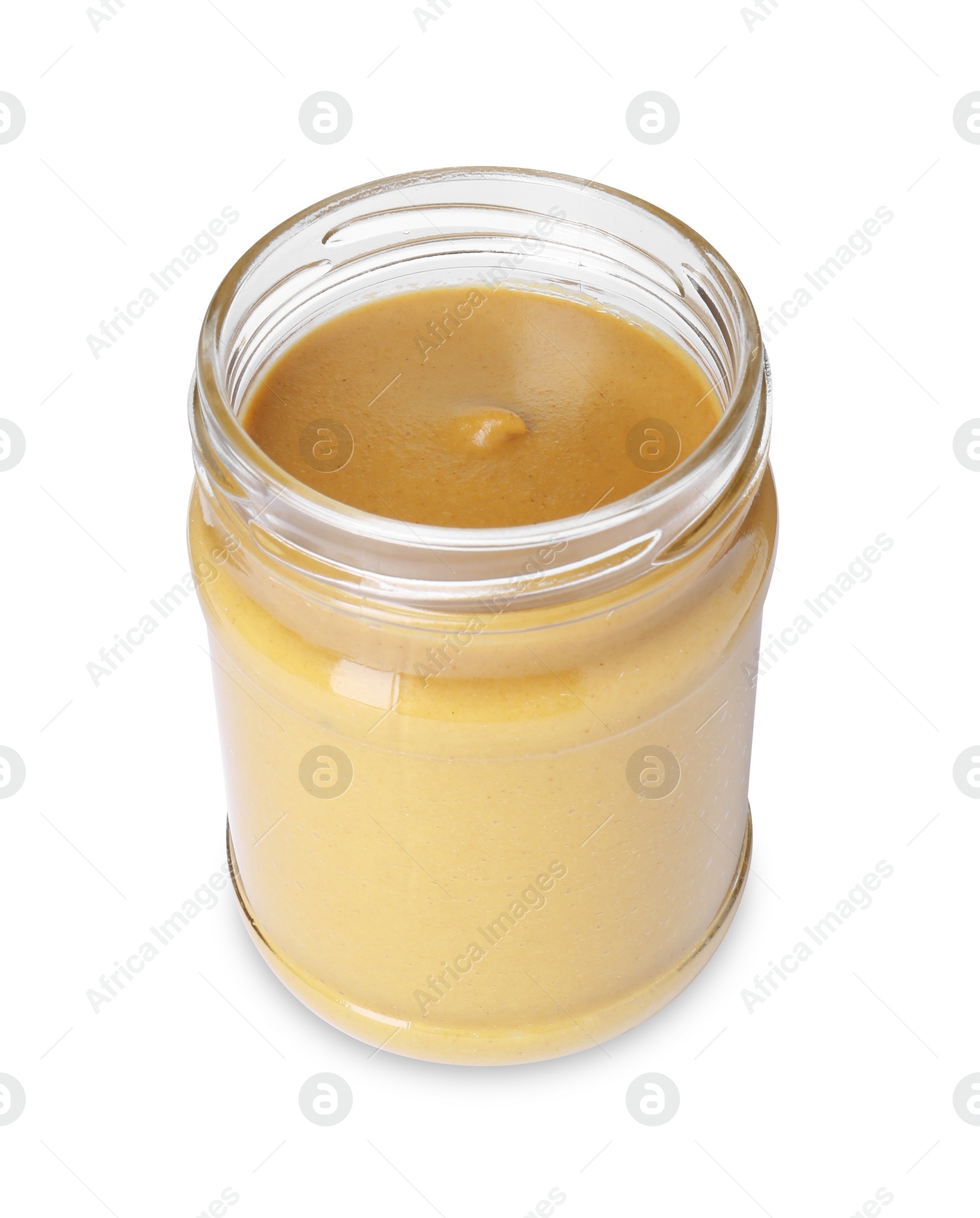 Photo of Fresh tasty mustard sauce in glass jar isolated on white