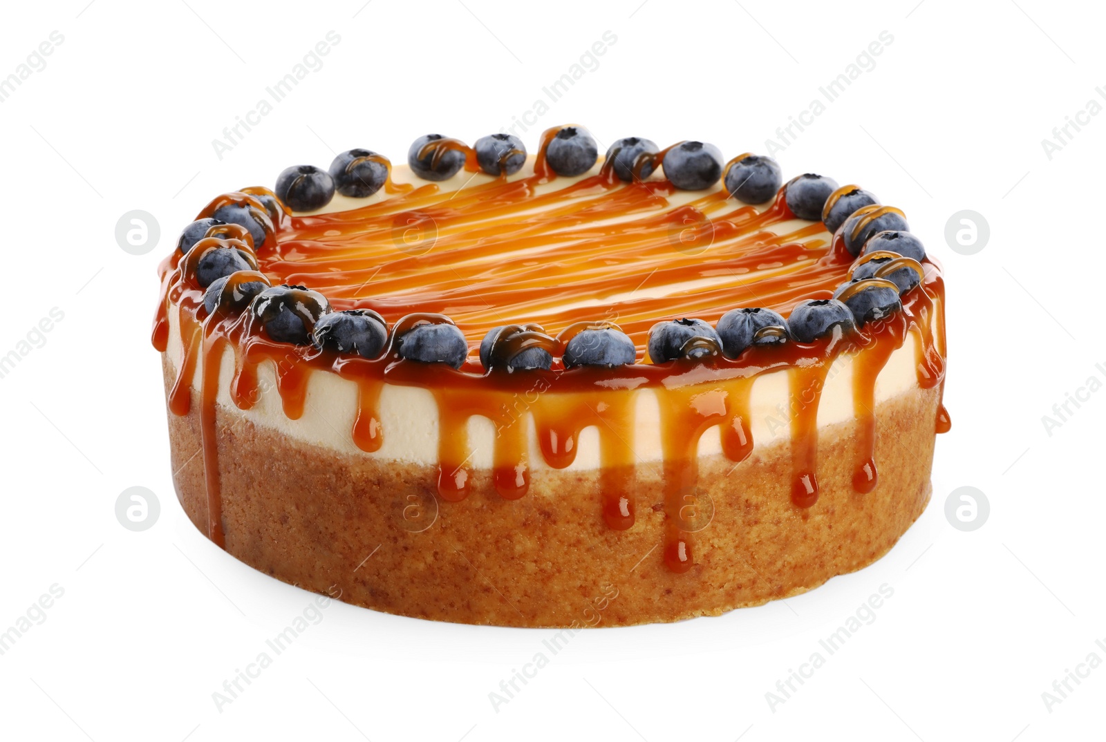 Photo of Delicious cheesecake with caramel and blueberries isolated on white