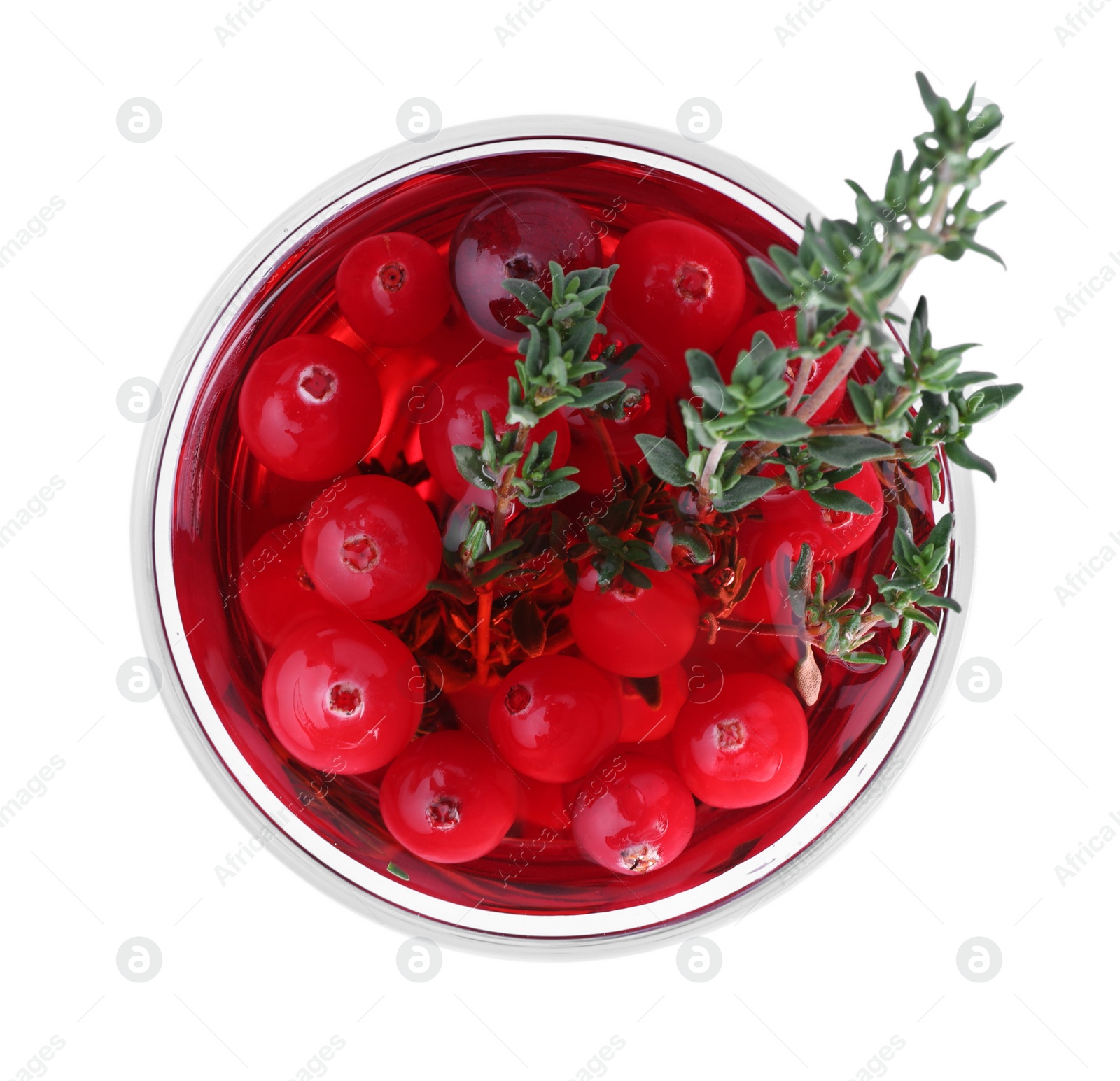 Photo of Delicious Christmas liqueur in glass on white background, top view