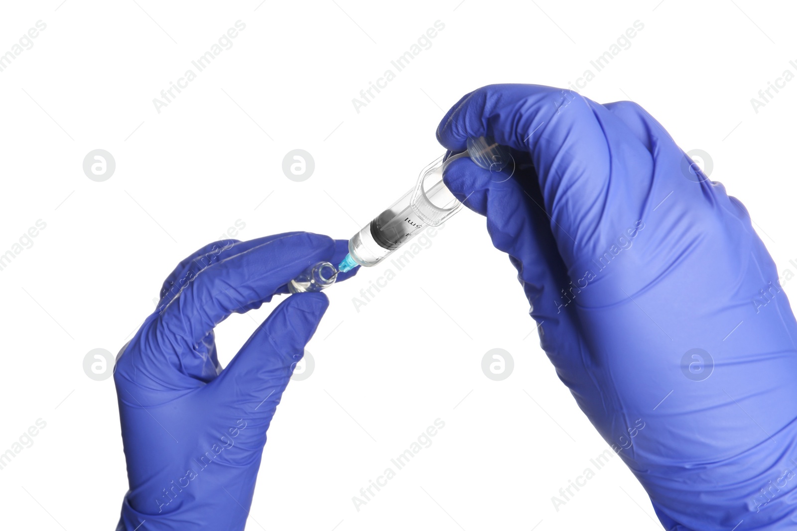 Photo of Doctor in medical gloves with syringe and ampule on white background