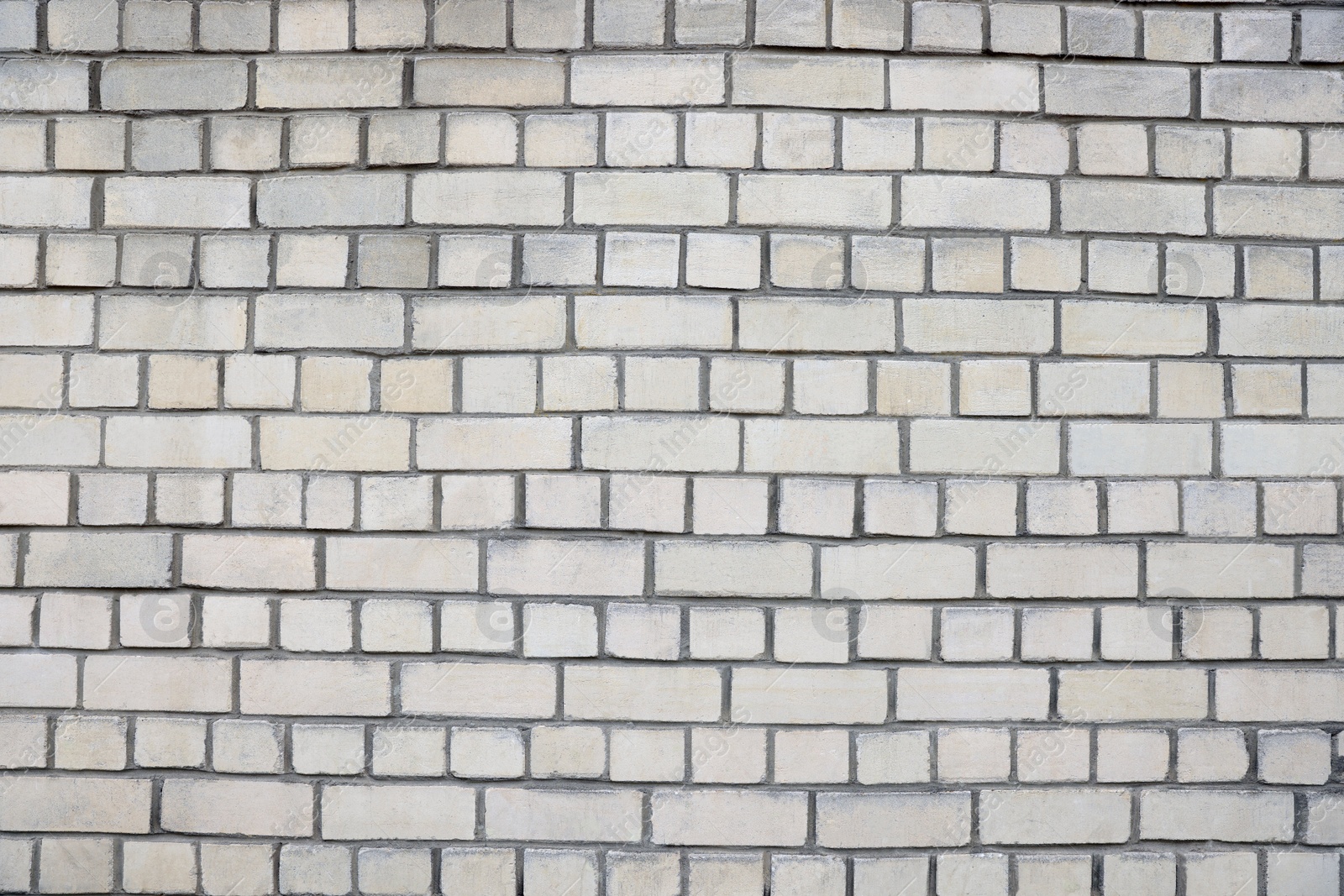 Photo of Texture of white brick wall as background