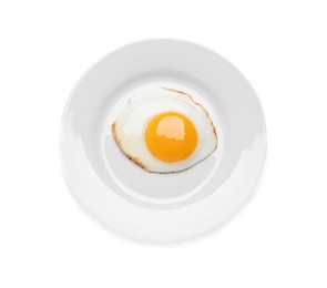 Photo of Plate with delicious fried egg isolated on white, top view