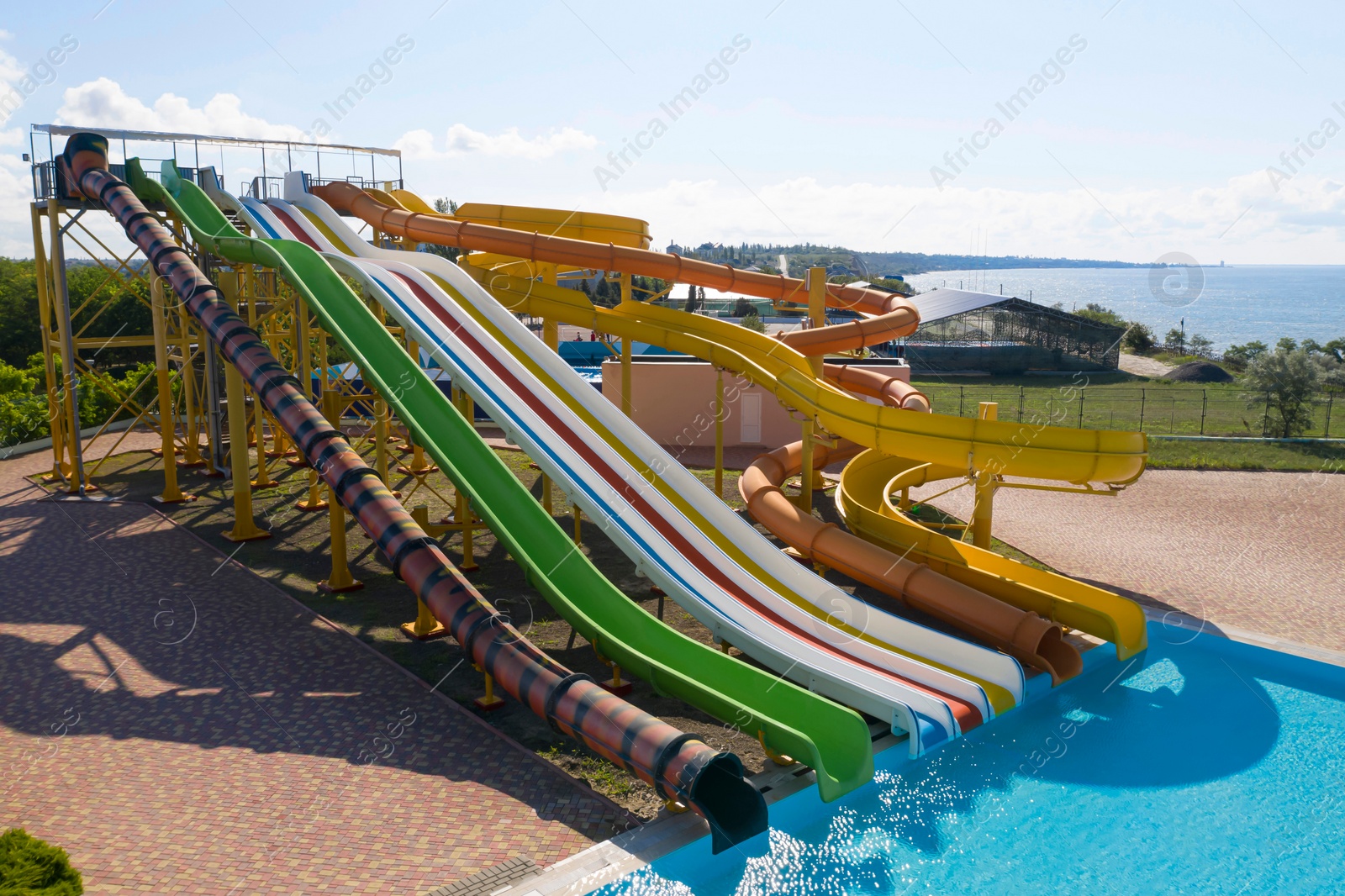 Image of Aerial view of water park on sunny day