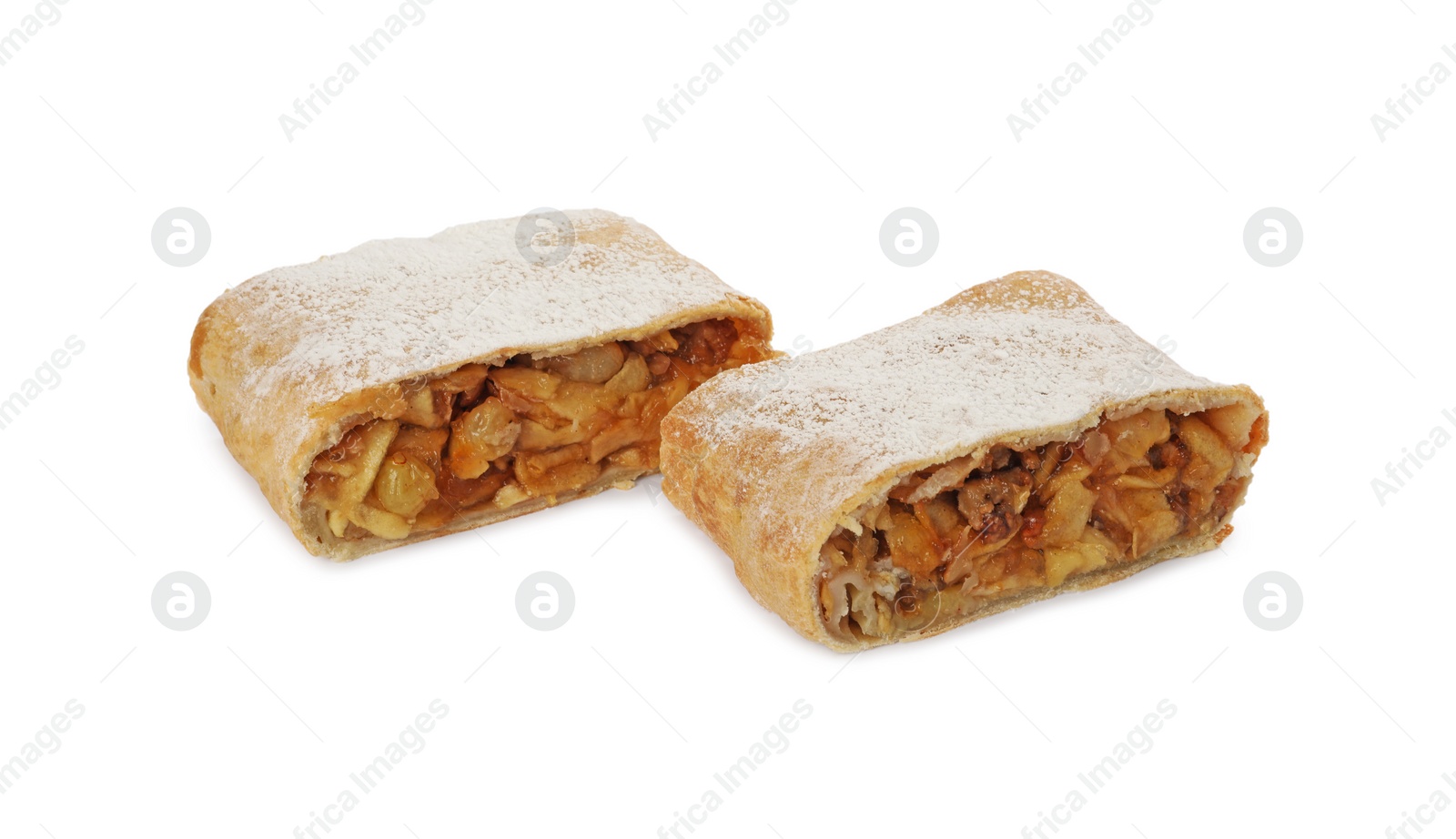 Photo of Delicious cut strudel with apples, nuts and raisins isolated on white