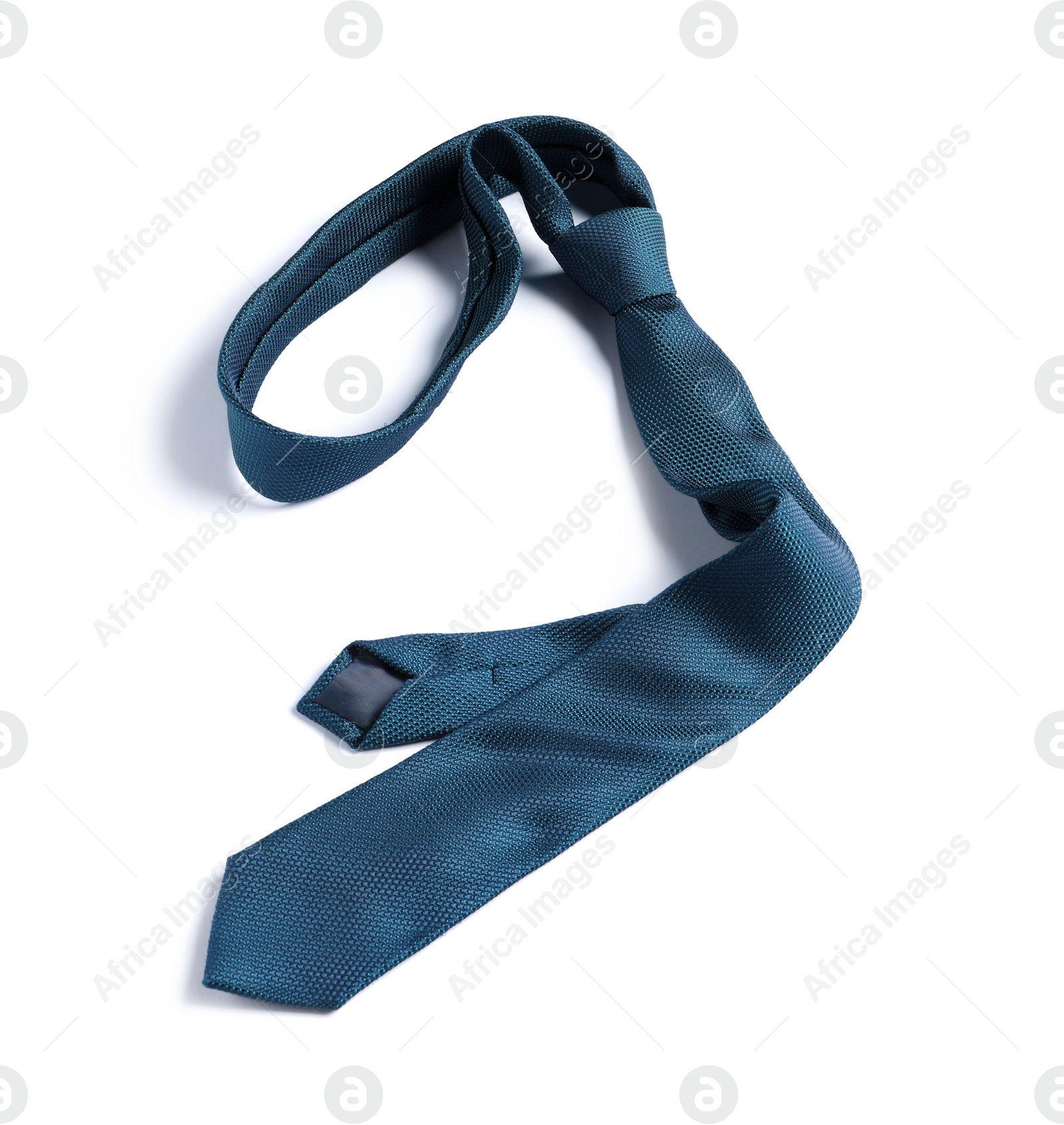 Photo of One blue necktie isolated on white, above view