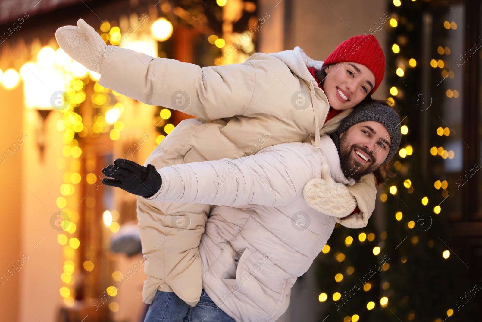 Photo of Lovely couple spending time together on city street