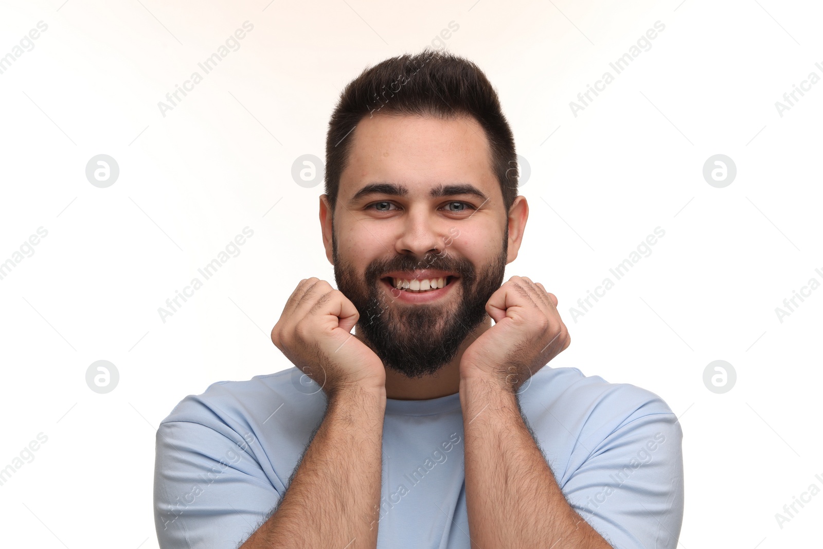 Photo of Man with clean teeth smiling on white background